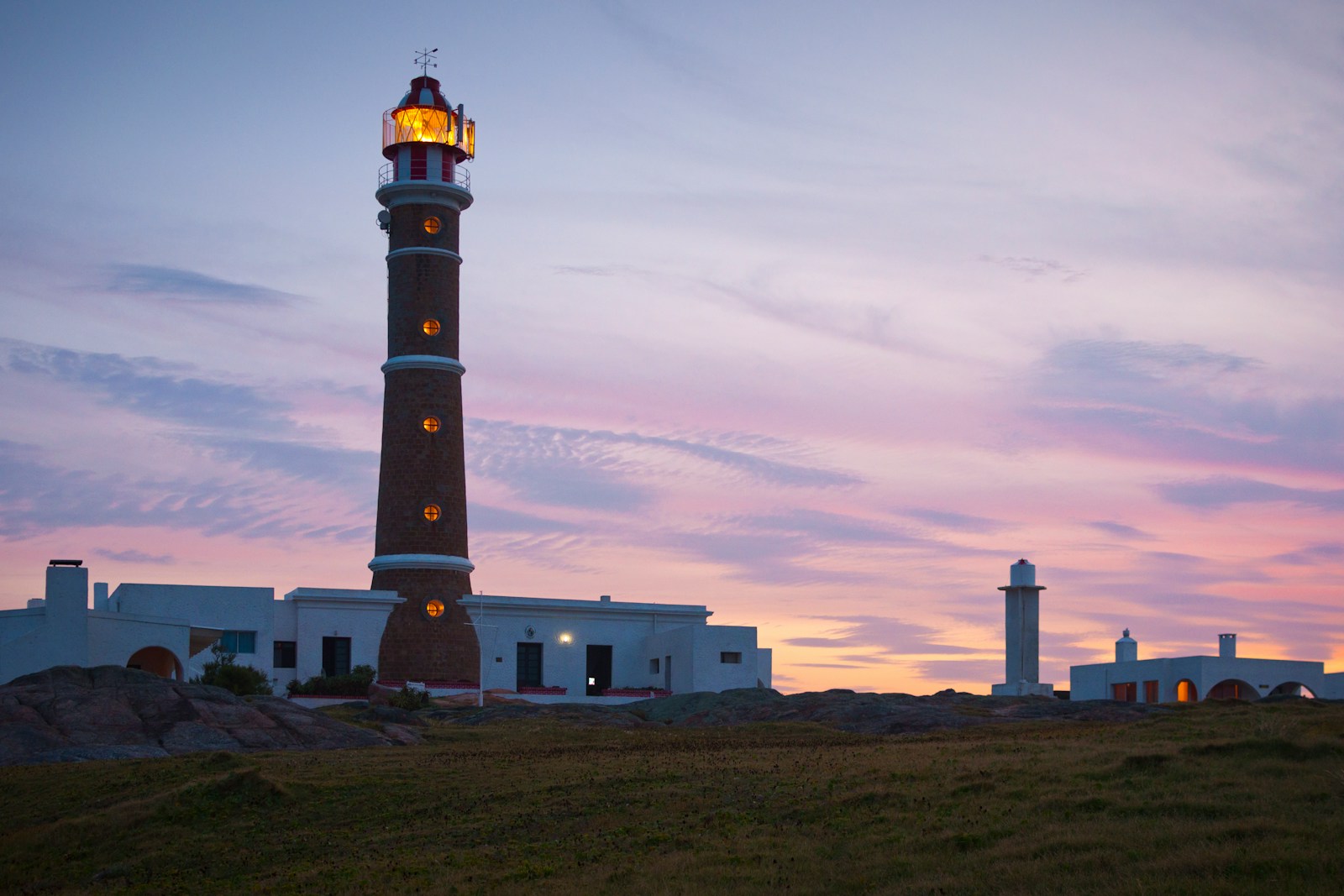 a tall tower with a light on top of it